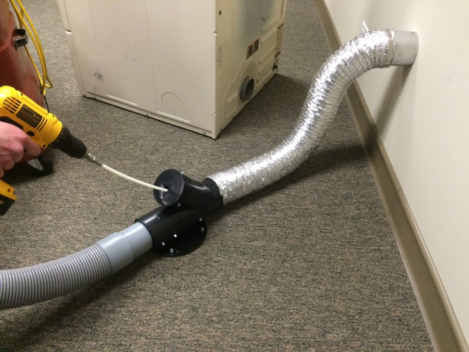 Dryer Vent Hose being Cleaned